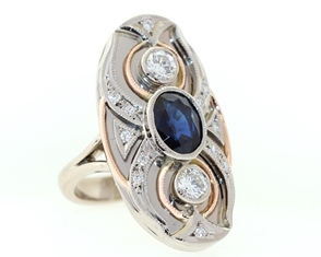 Yellow and white gold sapphire and diamond ring