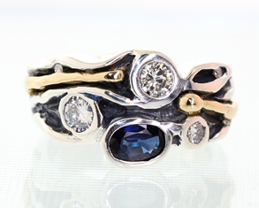 Silver and gold sapphire and diamond ring