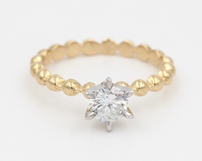 Single diamond bead ring