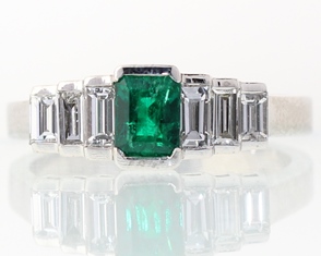 Emerald and diamond cut ring